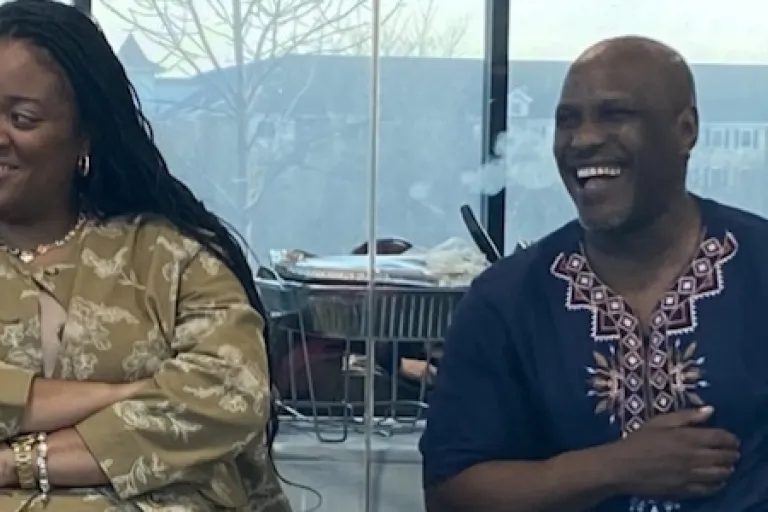 people sitting and smiling