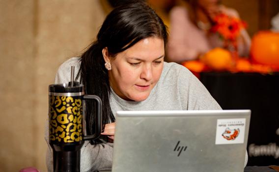 Woman focusing on a laptop
