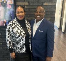a man and woman smiling